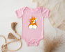 a pink baby bodysuit with a cartoon dog on it
