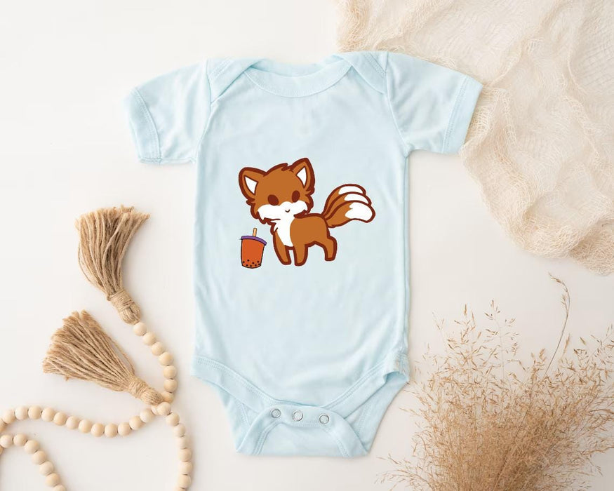 a baby bodysuit with a cartoon fox holding a drink