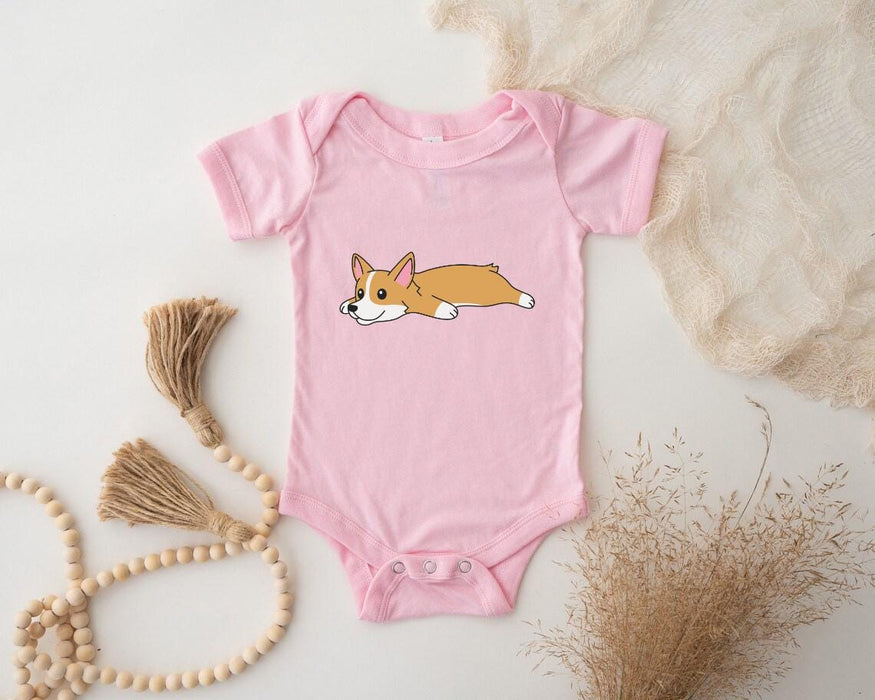 a pink baby bodysuit with a corgi on it