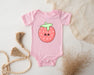 a pink baby bodysuit with a strawberry on it