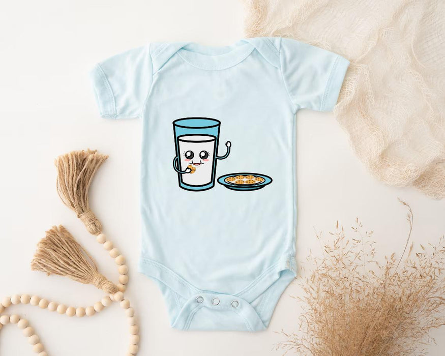 a baby bodysuit with a picture of a glass of milk and a plate of