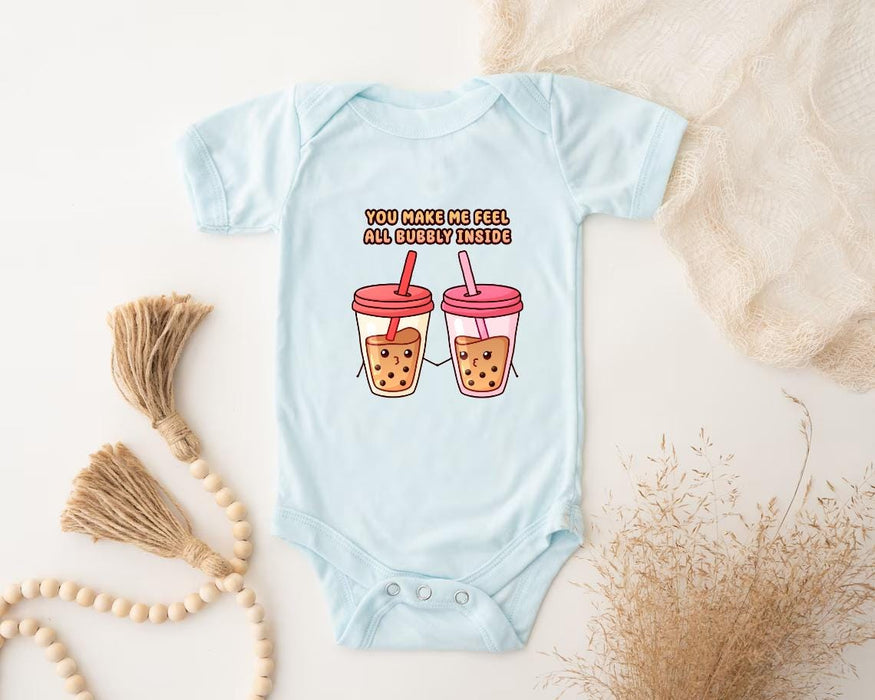 a baby bodysuit with two drinks on it