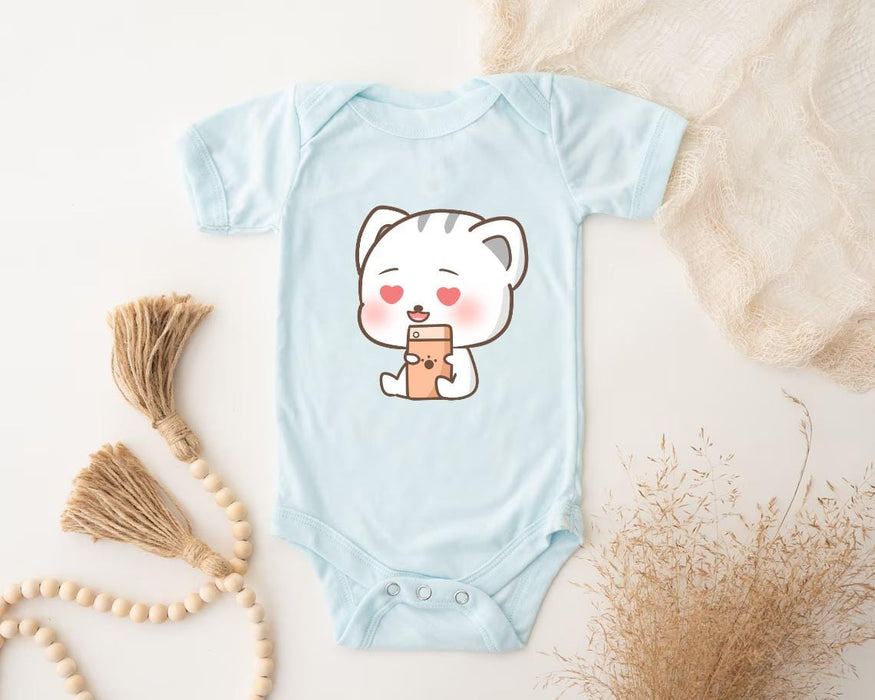 a baby bodysuit with a picture of a bear holding a cup