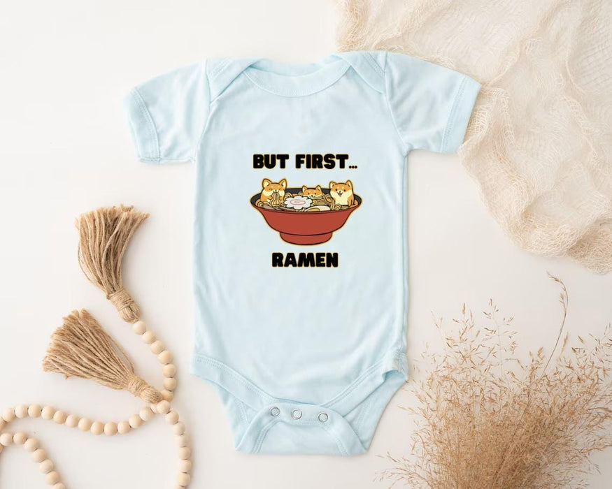 a baby bodysuit that says, but first, ramen