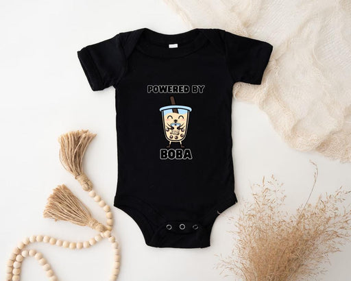 a baby bodysuit with a picture of a dog on it