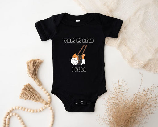 a baby bodysuit with a picture of a cat holding a baseball bat