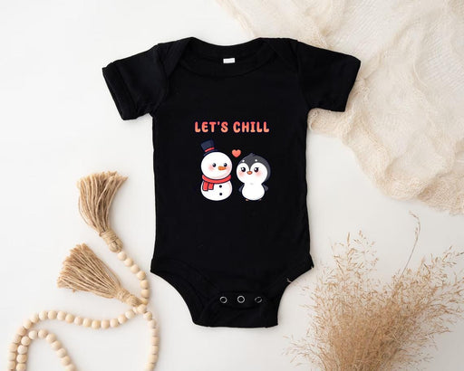 a baby bodysuit with a snowman and penguin on it