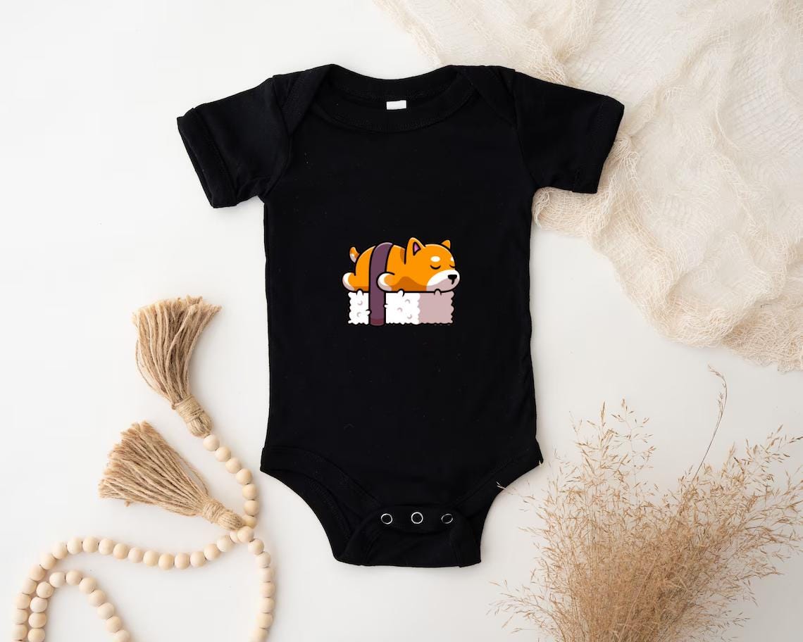 a baby bodysuit with a dog on it