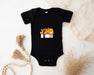 a baby bodysuit with a dog on it