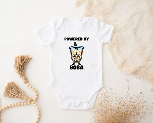 a baby bodysuit with a picture of a cartoon character on it