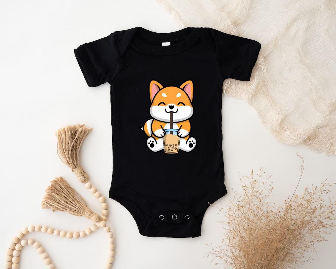 a baby bodysuit with a picture of a fox on it