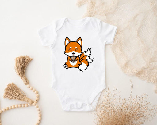 a baby bodysuit with a picture of a fox on it