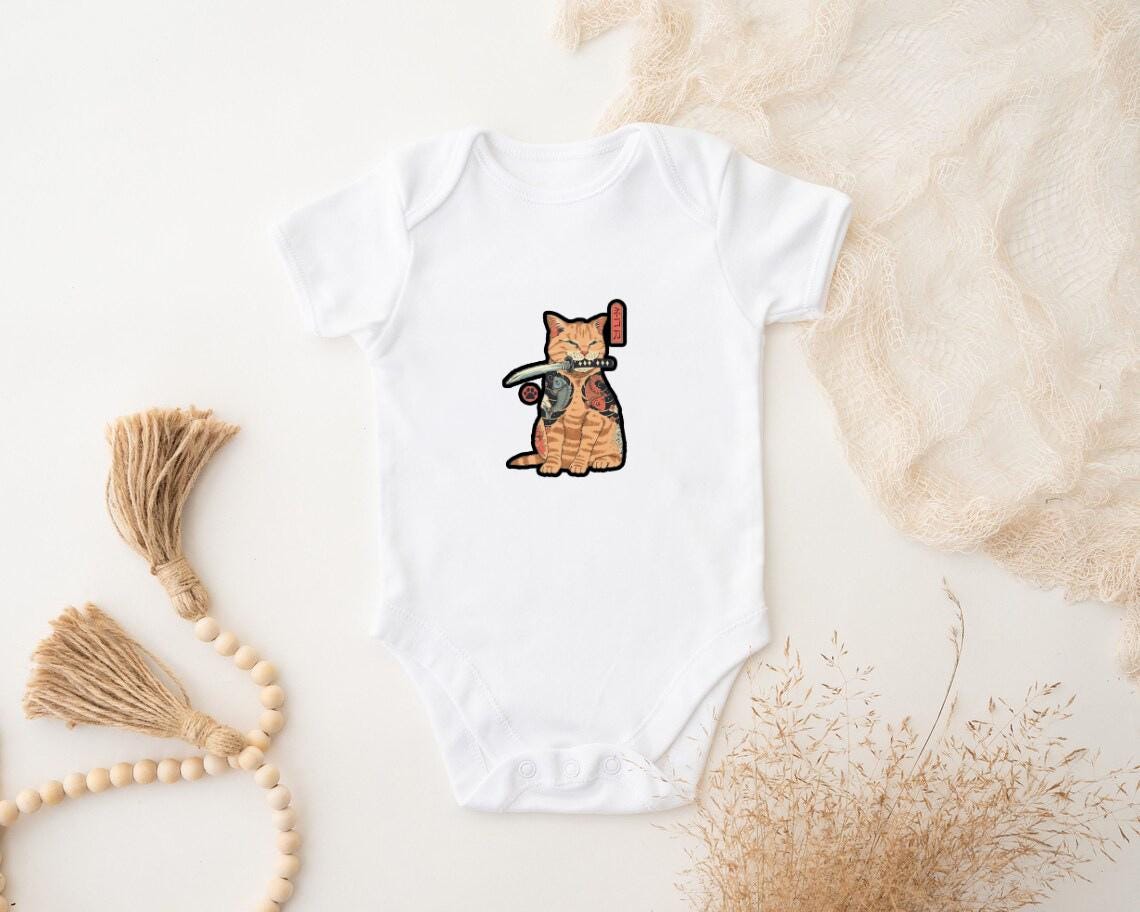 a baby bodysuit with a picture of a cat on it