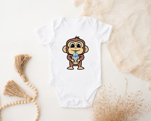 a baby bodysuit with a cartoon monkey on it