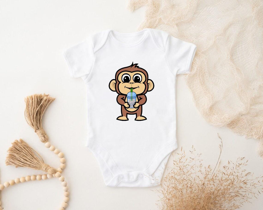 a baby bodysuit with a cartoon monkey on it