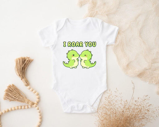 a baby bodysuit that says i roar you