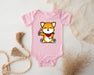 a pink baby bodysuit with a cartoon dog on it
