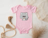 a baby bodysuit with a koala holding a cup of coffee