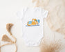 a baby bodysuit with a cartoon cat on it