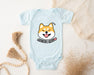 a baby bodysuit with a cartoon dog on it