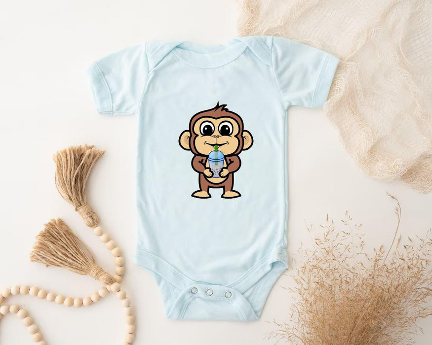 a baby bodysuit with a cartoon monkey on it