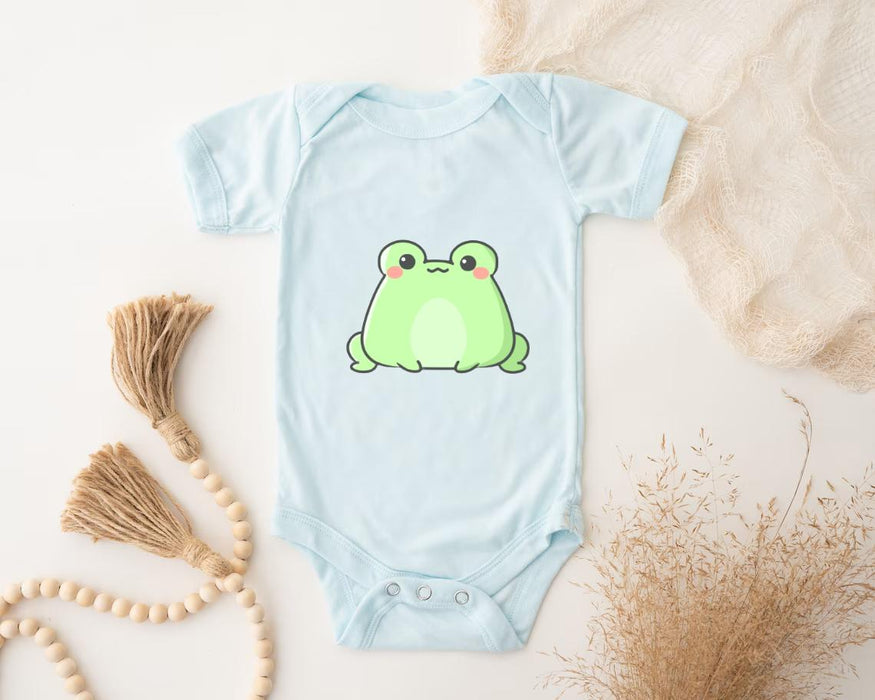 a blue bodysuit with a green frog on it