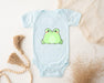 a blue bodysuit with a green frog on it