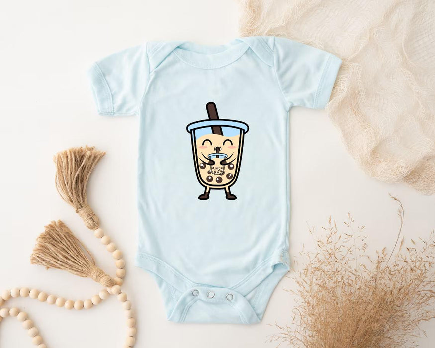 a baby bodysuit with a picture of a coffee cup on it