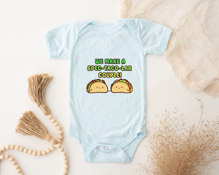 a baby bodysuit with two tacos on it