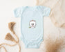 a baby bodysuit with a picture of a cat on it