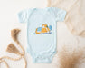 a baby bodysuit with a cartoon cat on it
