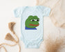 a bodysuit with a picture of a frog on it