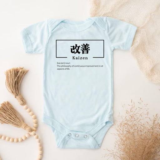 a baby bodysuit with a chinese character on it