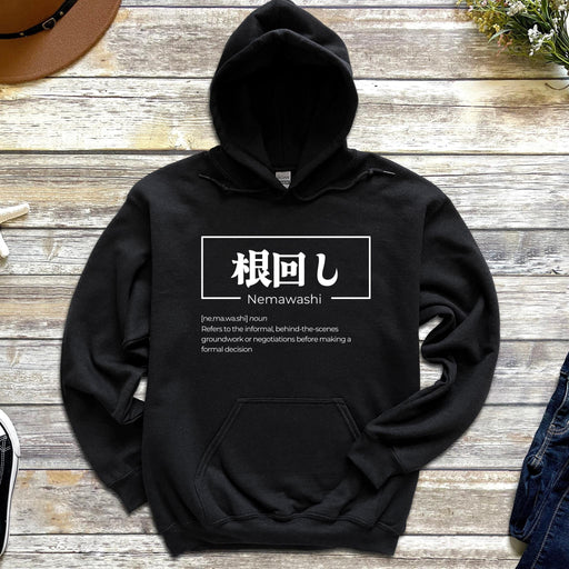 a black hoodie with a japanese language on it