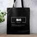 a black shopping bag with chinese writing on it