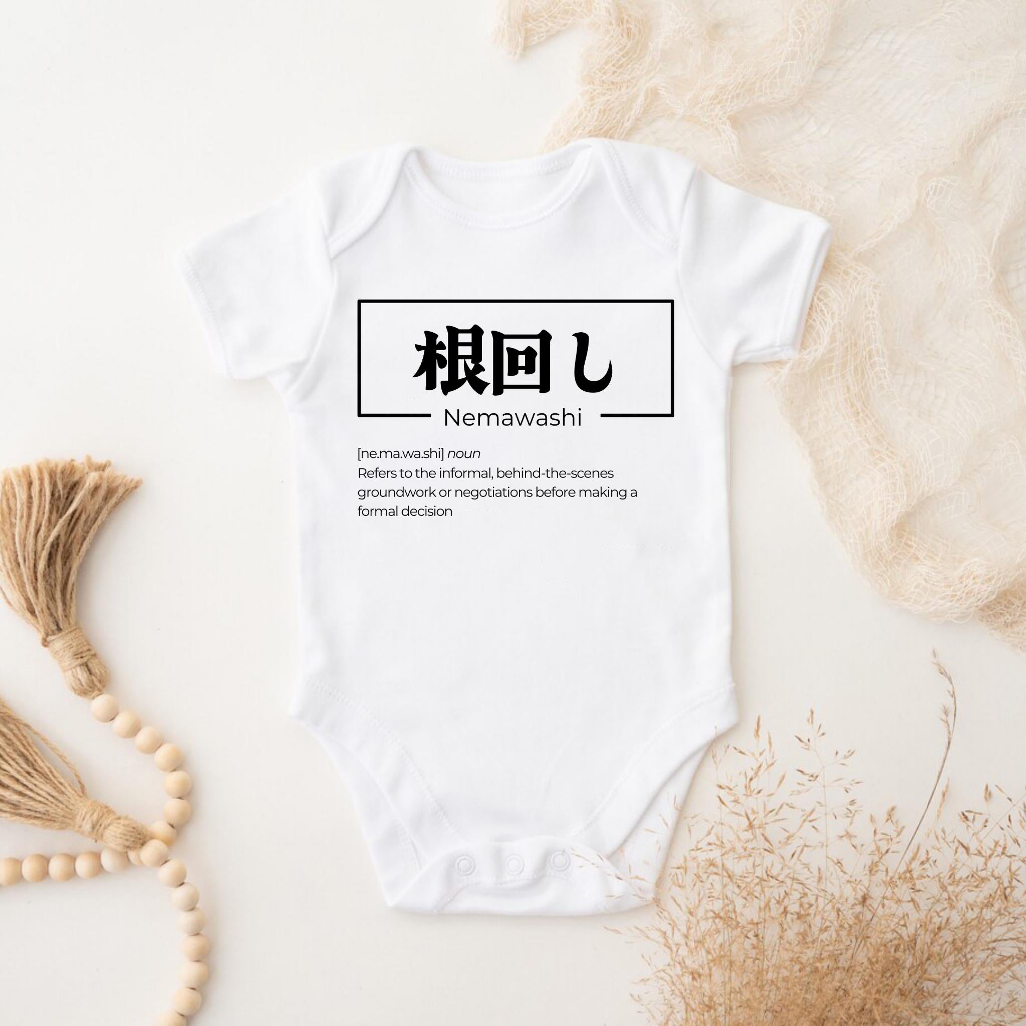 a white bodysuit with a japanese language on it