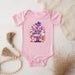 a baby bodysuit that says witch have my trick on it