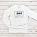 a white long sleeve shirt with chinese characters on it