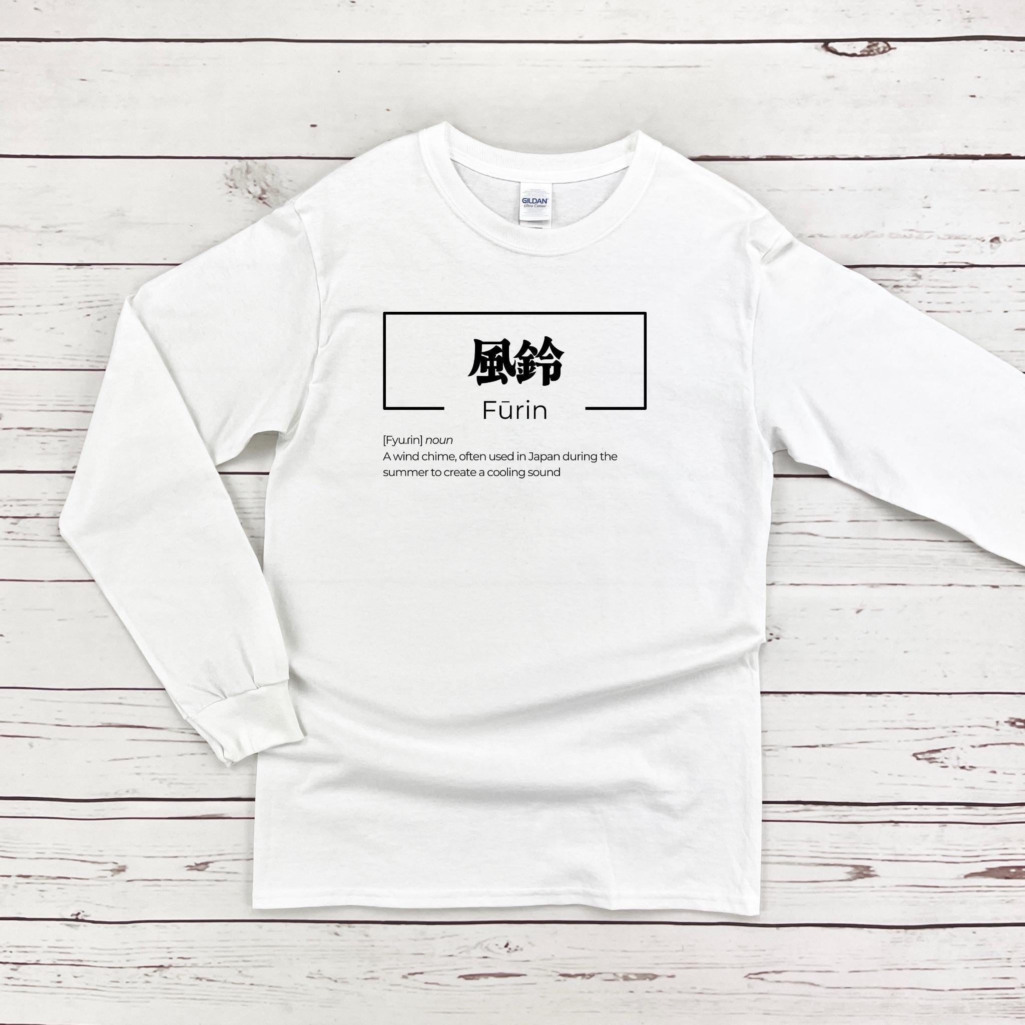 a white long sleeve shirt with the words fun on it