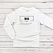 a white long sleeve shirt with the words fun on it