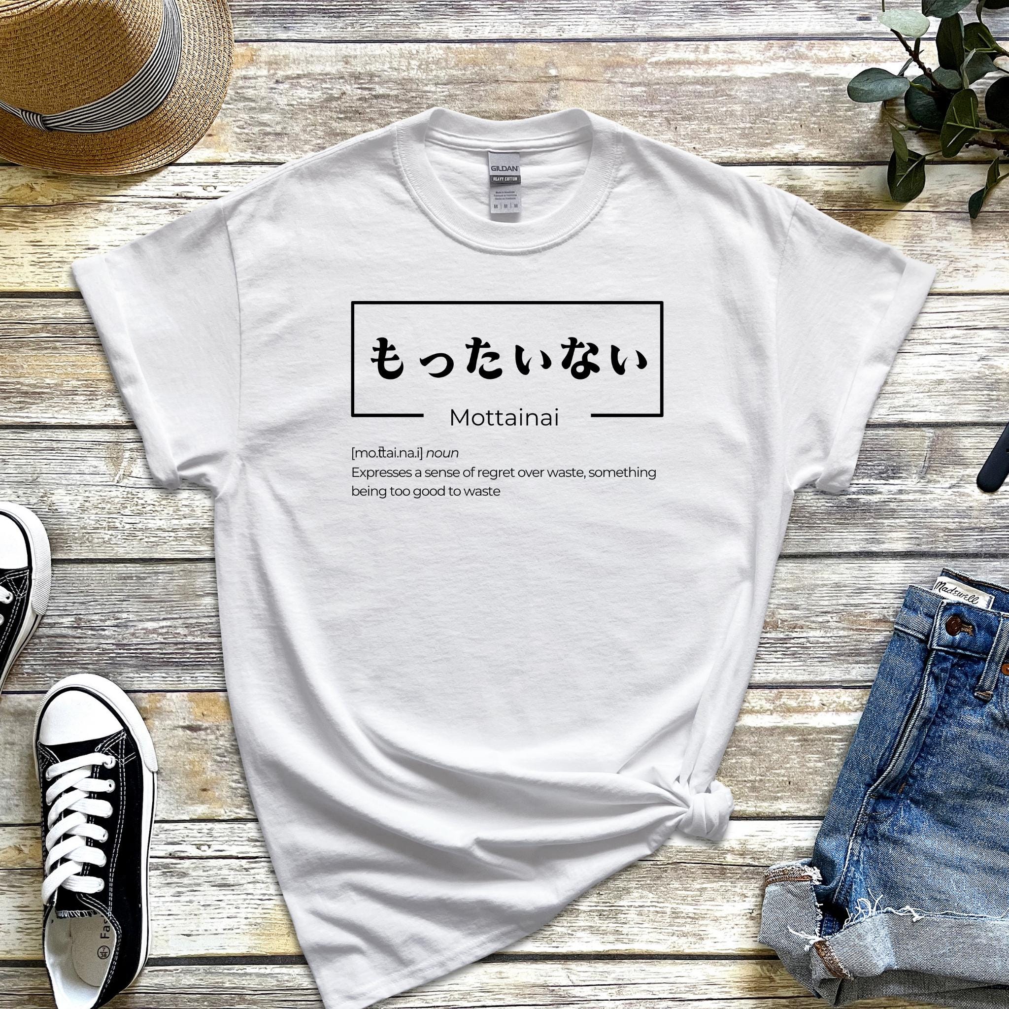 a white t - shirt with japanese writing on it