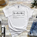 a white t - shirt with japanese writing on it