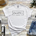 a white t - shirt with japanese characters on it