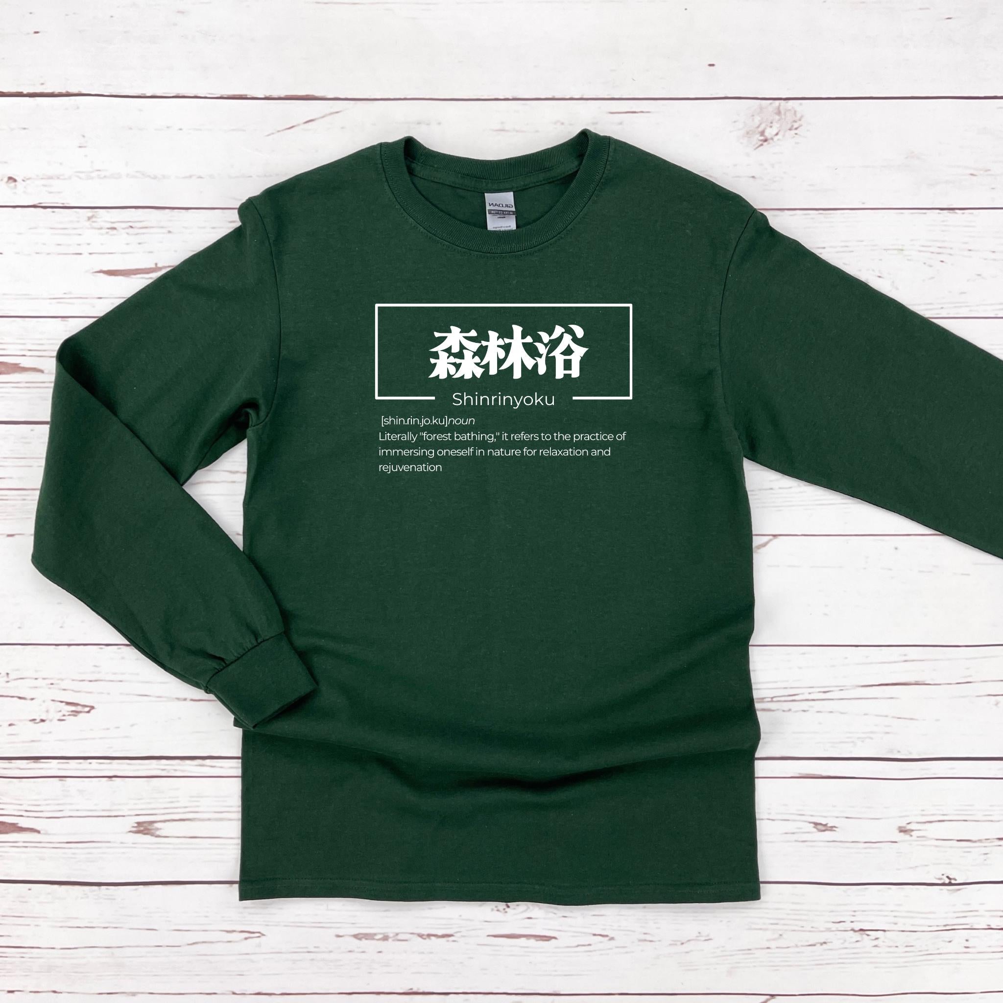 a green long - sleeved shirt with chinese characters on it