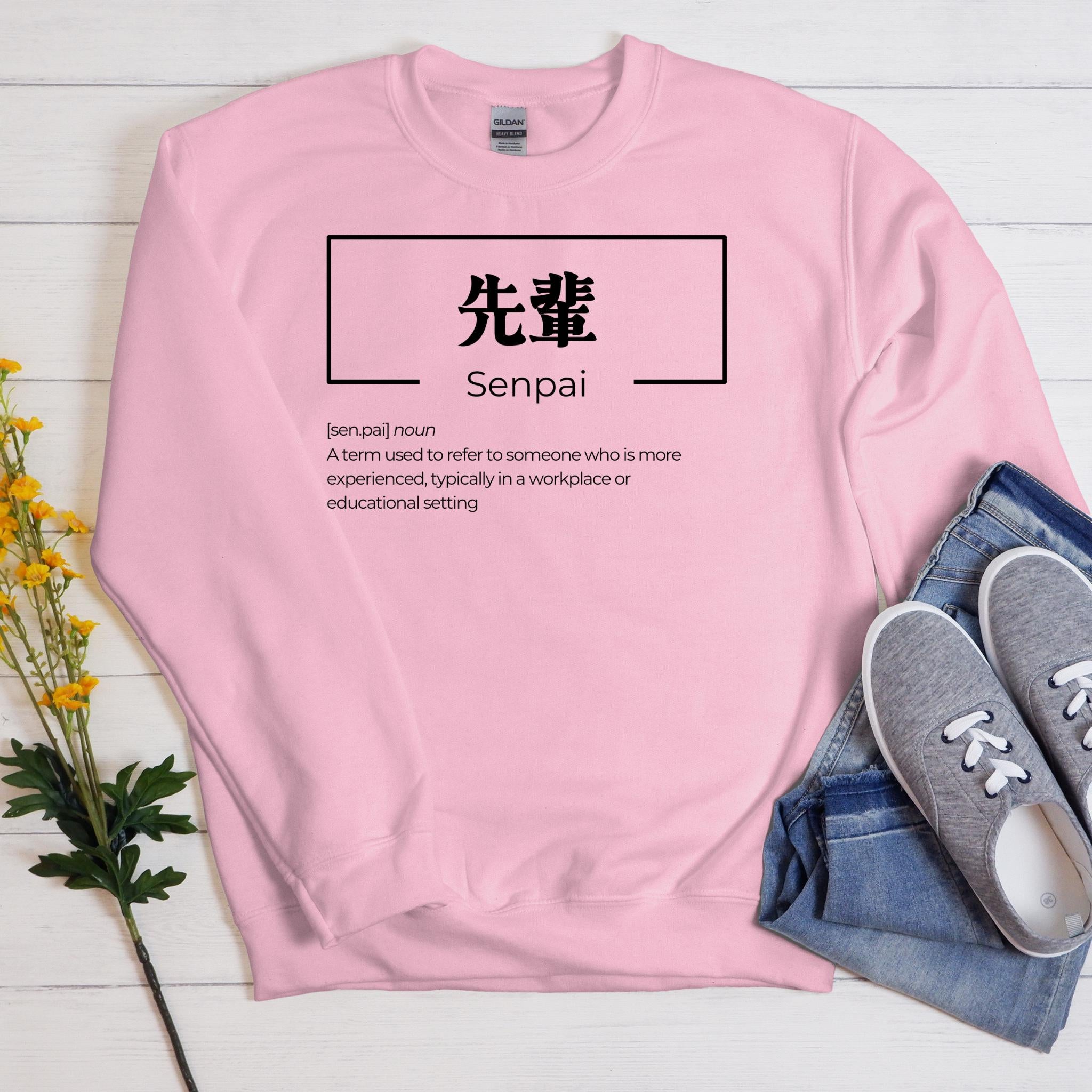 a pink sweatshirt with the words sempi on it