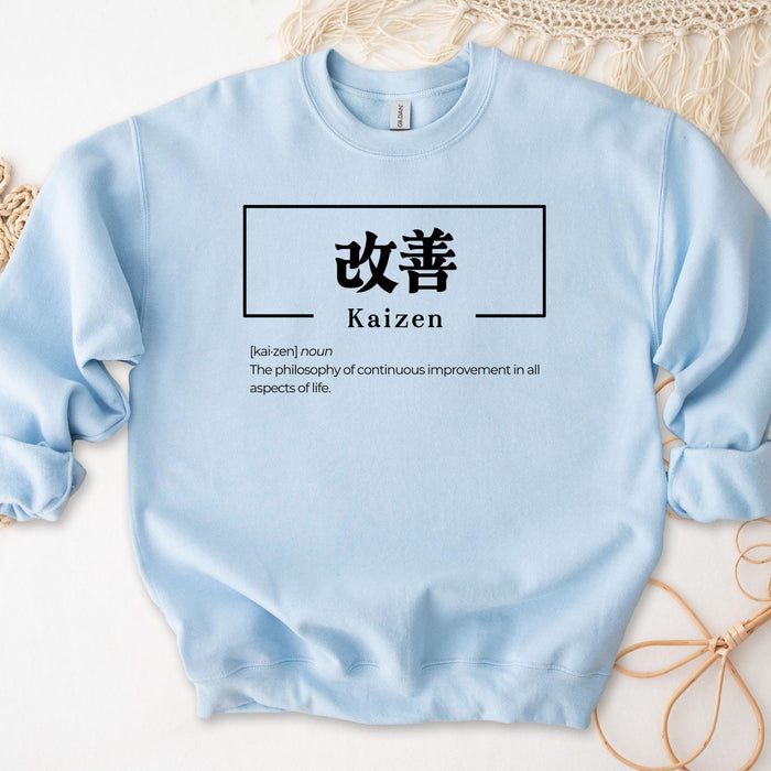 a light blue sweater with a japanese symbol on it