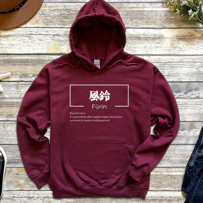 a maroon hoodie with the words fun printed on it