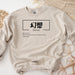 a white sweatshirt with chinese writing on it