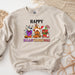 a white sweatshirt with a happy thanksgiving design on it