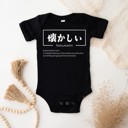 a black bodysuit with japanese writing on it